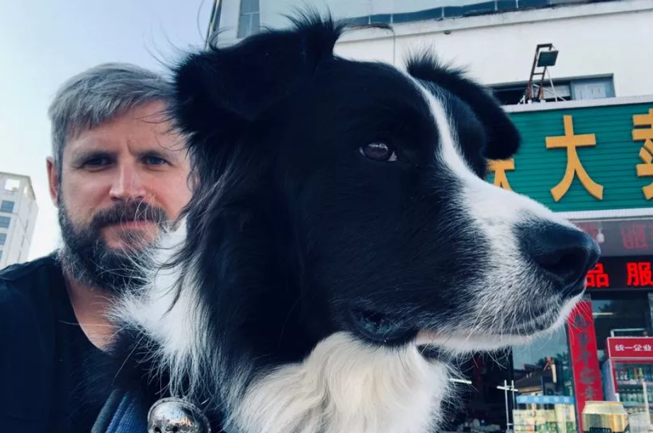 Man with Border Collie Dog